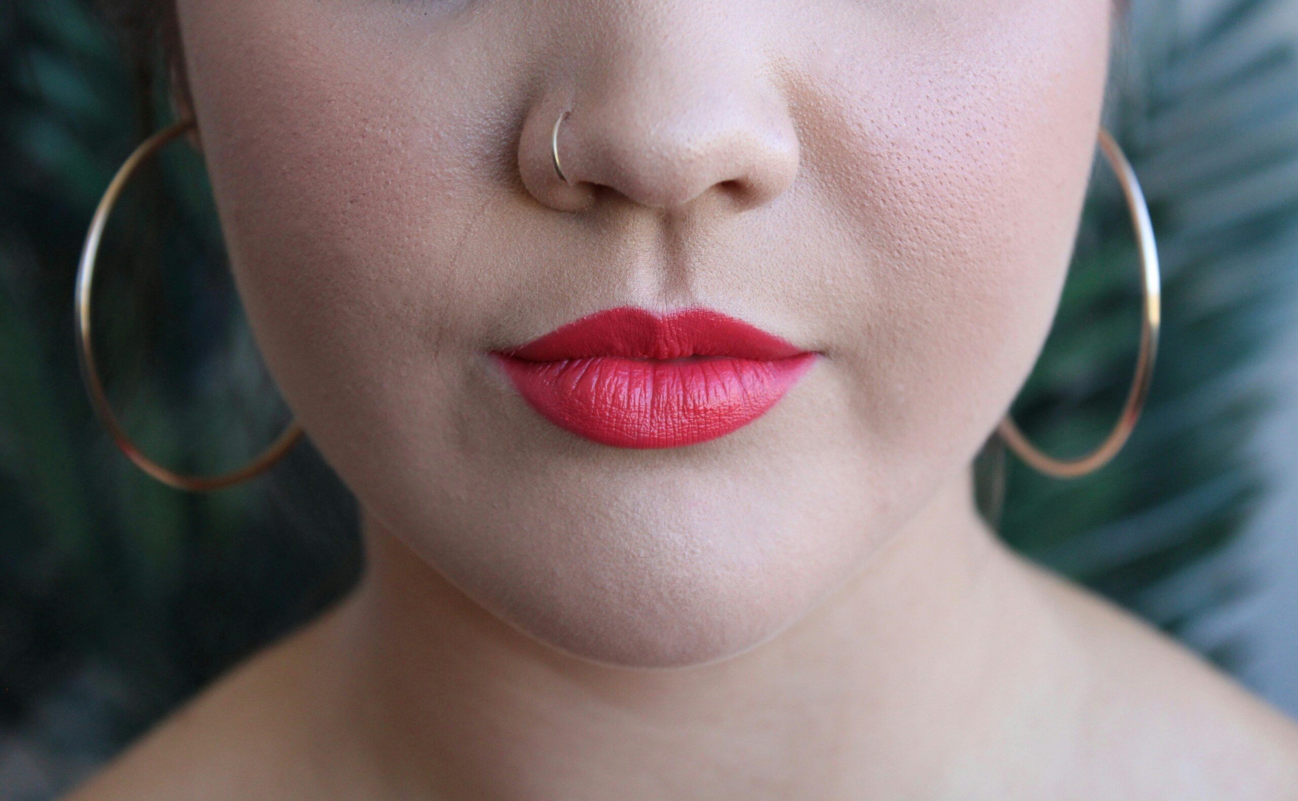 Bride smiling confidently with bold red lipstick