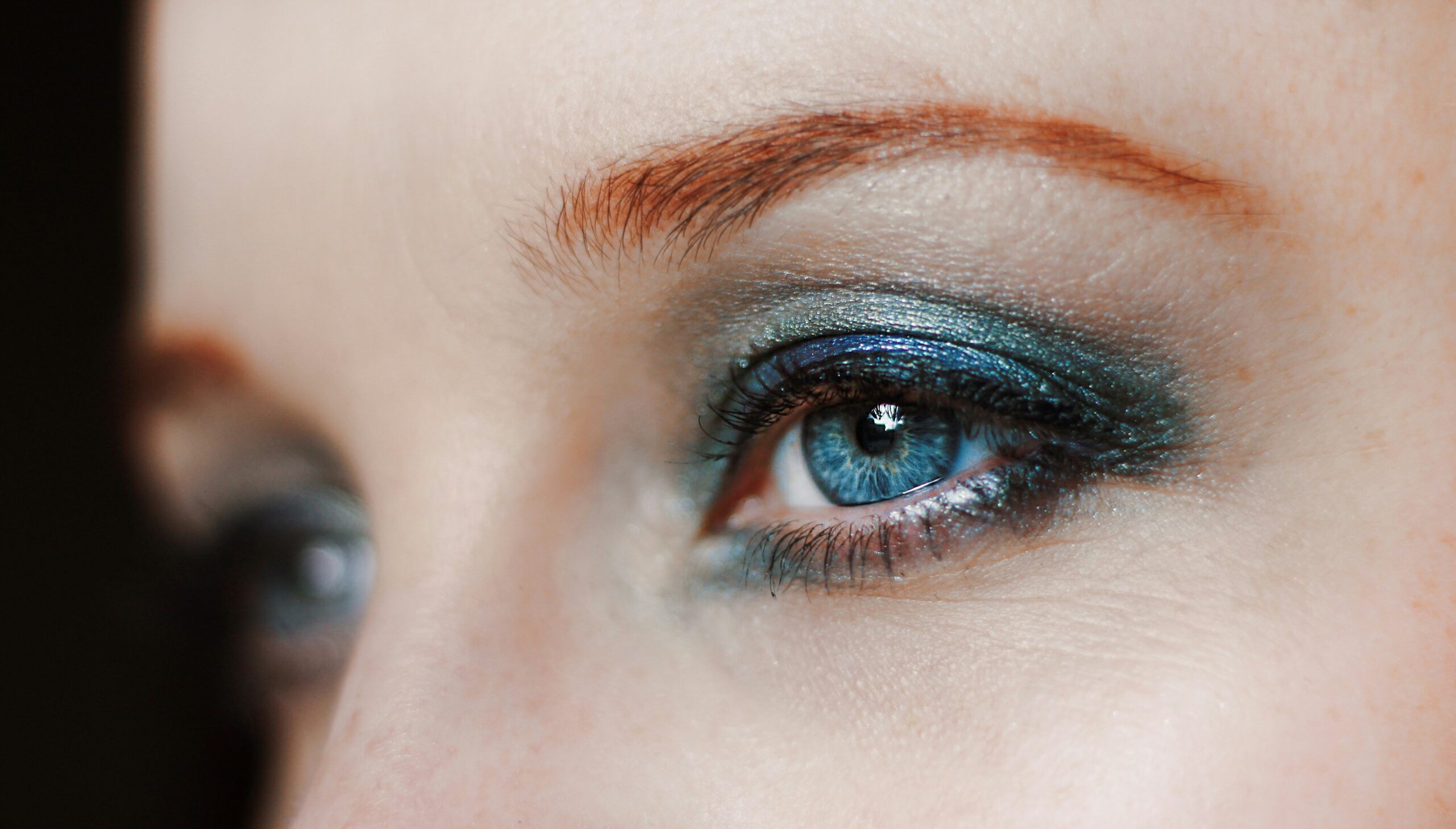 Close-up shot of a smiling bride showcasing well-applied eyeshadow