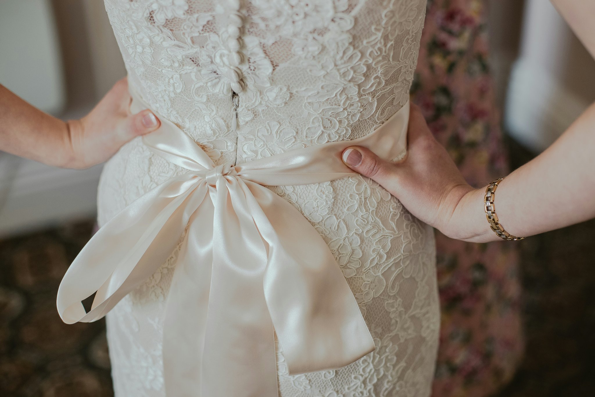 Bride getting skincare treatment before wedding day