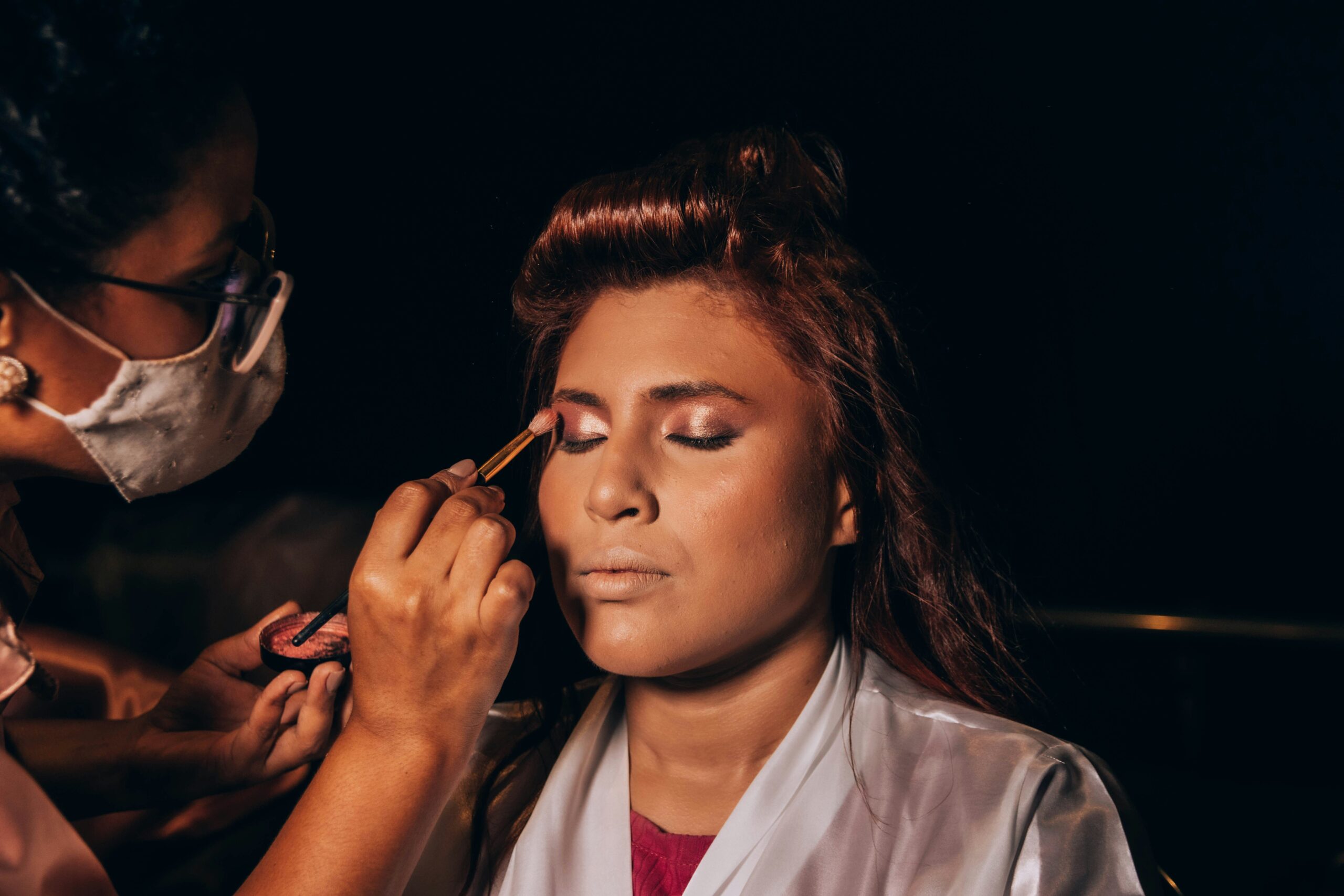Bride looking pale under harsh studio lights.