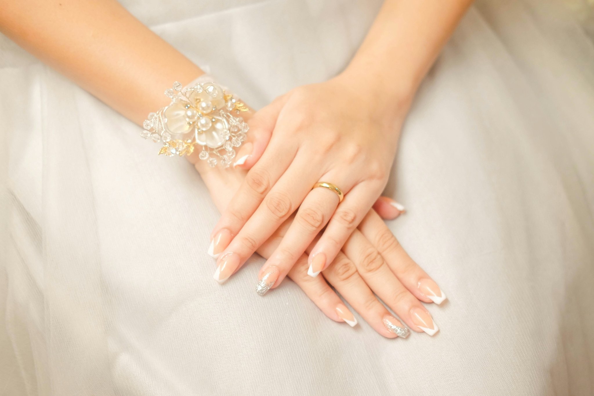 Close-up shot of radiant bride wearing elegant bridal makeup.