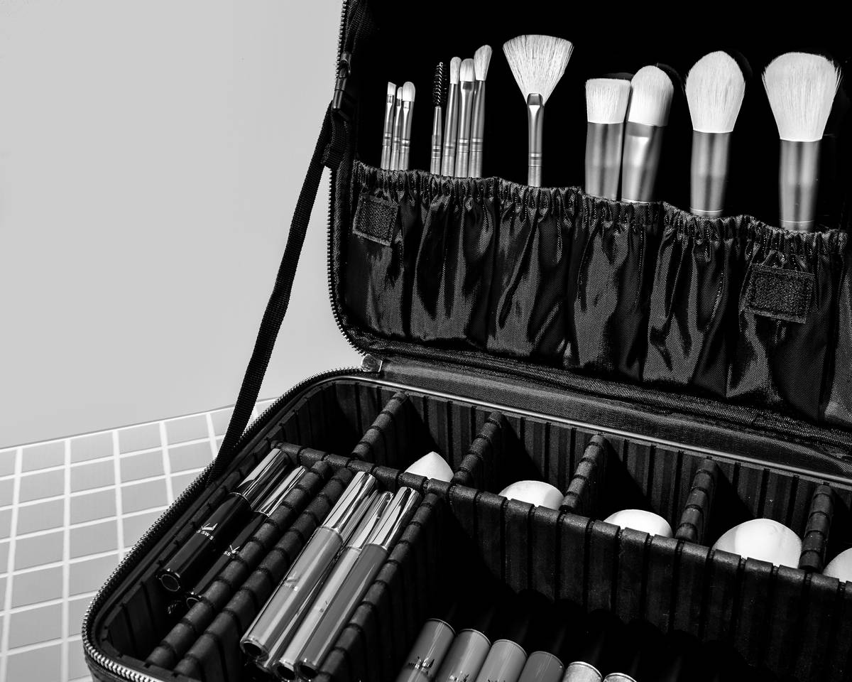 Comparison image illustrating differences between using a brush versus a sponge for bridal makeup application.