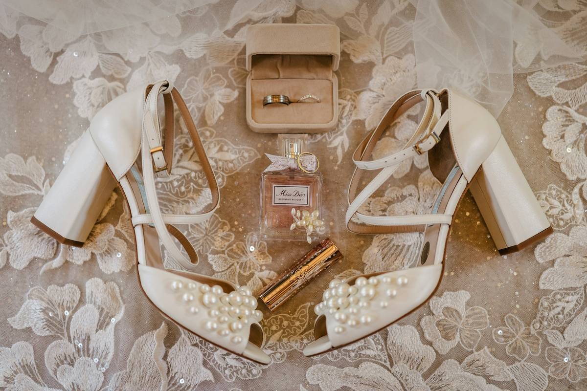 A spilled makeup bag showing scattered products across a table