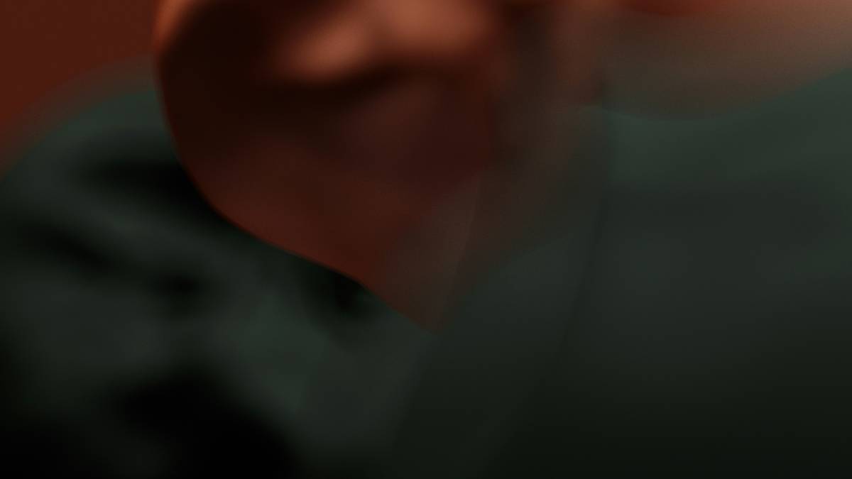 A professional applying light makeup on a middle-aged man for a wedding