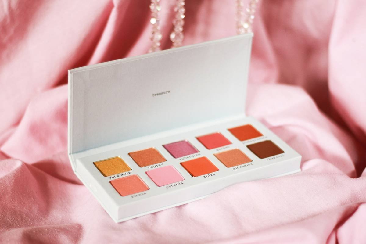 Side-by-side comparison of a generic eyeshadow palette vs. professional wedding makeup palette showing pigment density, shade range, and texture variety