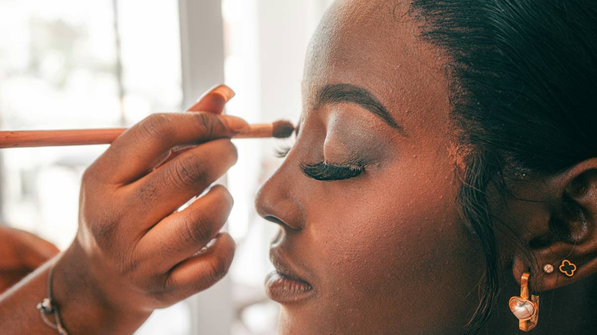 close-up of flawless bridal shower makeup looks with glowing skin and soft smoky eyes